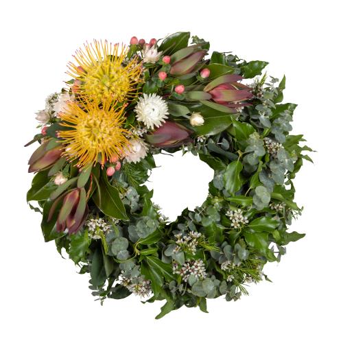 
	This beautiful funeral wreath features a stunning combination of flowers and foliage to pay tribute...