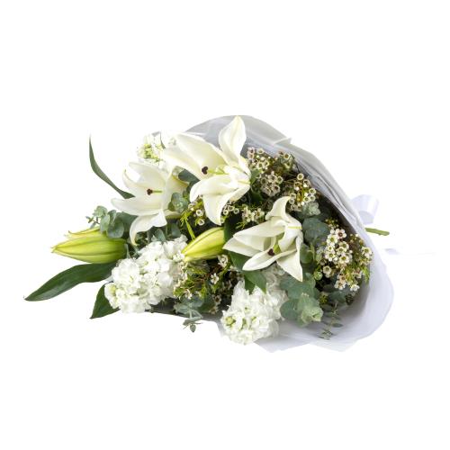 
	Simple and elegant - this white flower bouquet has stunning white oriental lilies, accompanied with...