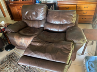 Giving away 2 leather loungers away. Please see photos as one sofa is extractable.Pick up only and free...