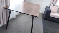 Modern Dining TableDark wood dining table modern design.150 x 90 x 75cmSmall mark on one cornerBuyer...