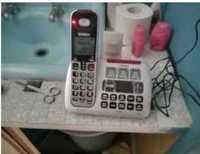 Big button phone and answering machineBrand new batteries and manual included