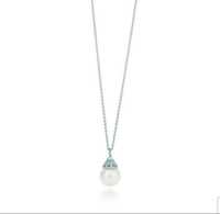 16" sterling silver chain with a freshwater cultured pearl. Inspired by Tiffany creations from the...