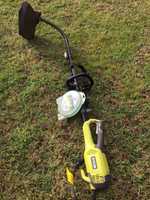 Ryobi electric grass line trimmer including grass trimmer line for sale. Near to new condition-only...