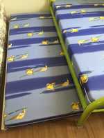 Gecko brand Single adult slat bed with green frame and foam mattress. Also includes Gecko single adult...