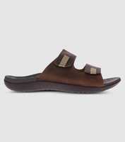 Enjoy all day comfort wearing the  Connor slides for men. The Scholl Orthaheel footbed provides all day...