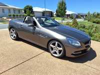 Immaculate condition. Indium grey, walnut interior, custom built in Germany.Heated seats and neck...