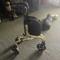 2 X mobility walkers . Triangler style easy to fit through narrow doorways . Both have zip up carry...