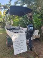 14 FT TINNIE WITH NEAR NEW 20 HP MOTOR