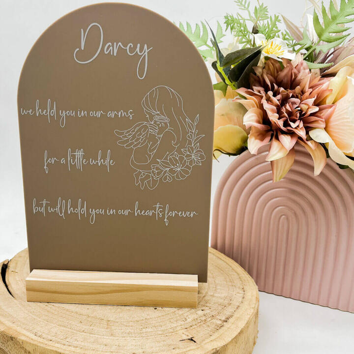Some loves stay with us forever, even when held for only a moment. This personalised memorial arch...