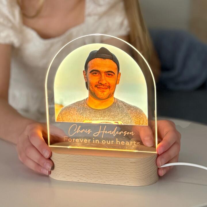Keep their memory glowing gently with this beautifully personalised memorial photo light. Thoughtfully...