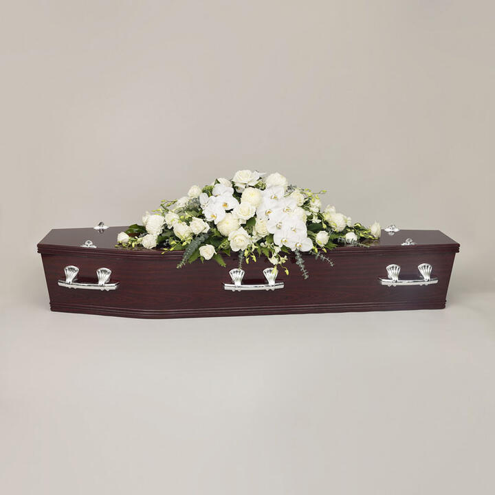 Premium Casket Flowers presents a luxurious and elegant tribute adorned with a grand array of blooms.