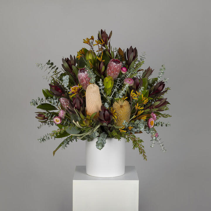 The Native Chapel Arrangement is a tribute to the natural beauty of Australia, perfect for those who...