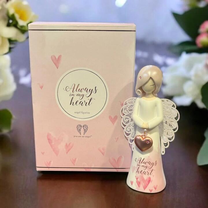 A beautiful angel memorial figurine with pink wings and “Always in my heart” message. A thoughtful...