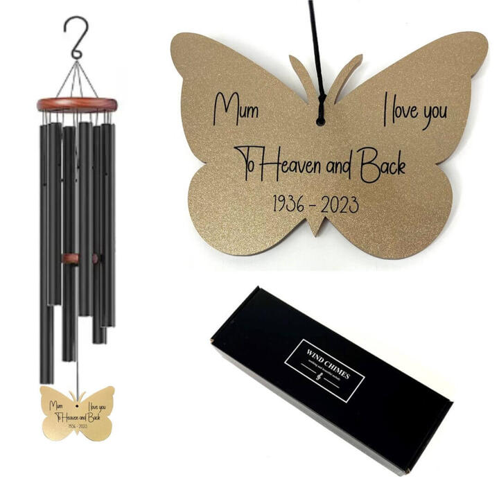 Personalised memorial wind chimes with gold butterfly plaque. A heartfelt outdoor tribute with custom...