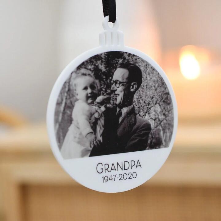 Honour loved ones with a personalised memorial photo ornament. UV printed white acrylic keepsake, 7.5cm...