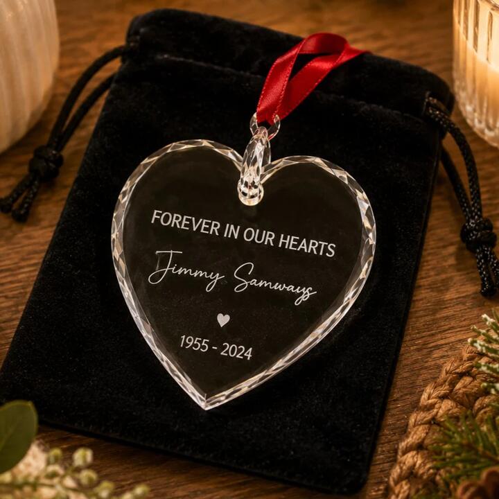 Personalised 78 × 77 mm crystal heart memorial ornament engraved with “Forever in Our Hearts.” Includes...