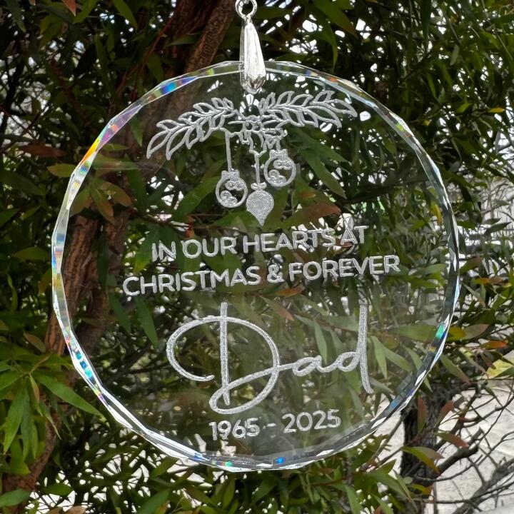 Create your own 78 mm round crystal memorial ornament with custom engraving. Add your message, name, or...