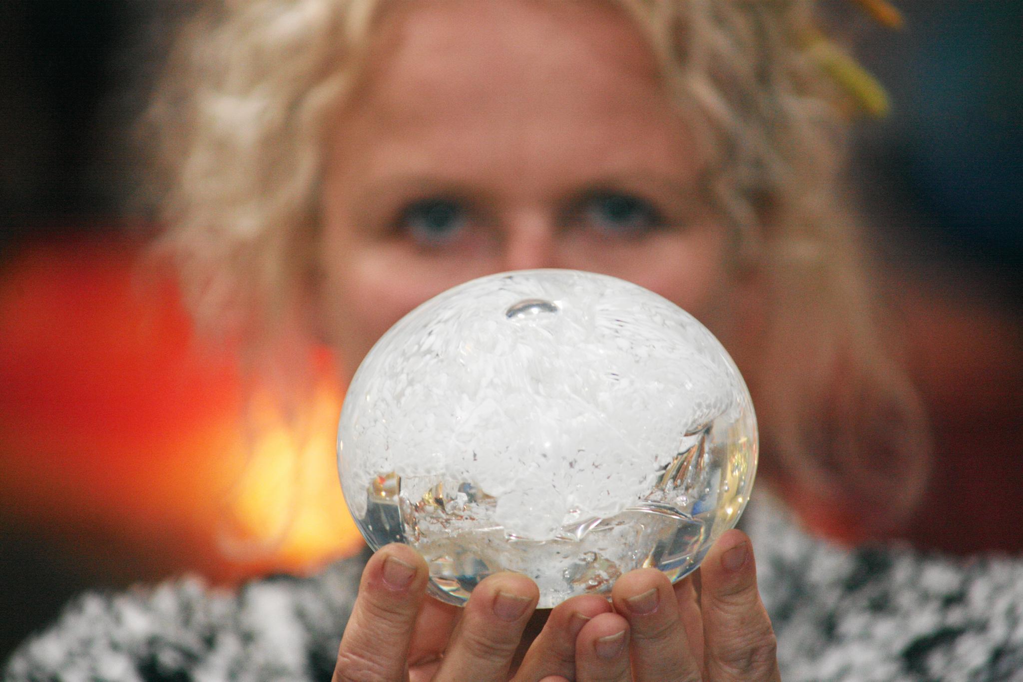 Montville glass artist Tina Cooper with one of her "Forever Yours" Memorial Orbs. Photo: Darryn Smith / Sunshine Coast Daily