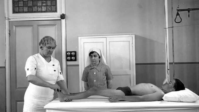 Sister Elizabeth Kenny demonstrating her therapy for polio patients to another nursing sister in a hospital in Queensland in 1939. Photo: John Oxley Library, State Library of Queensland