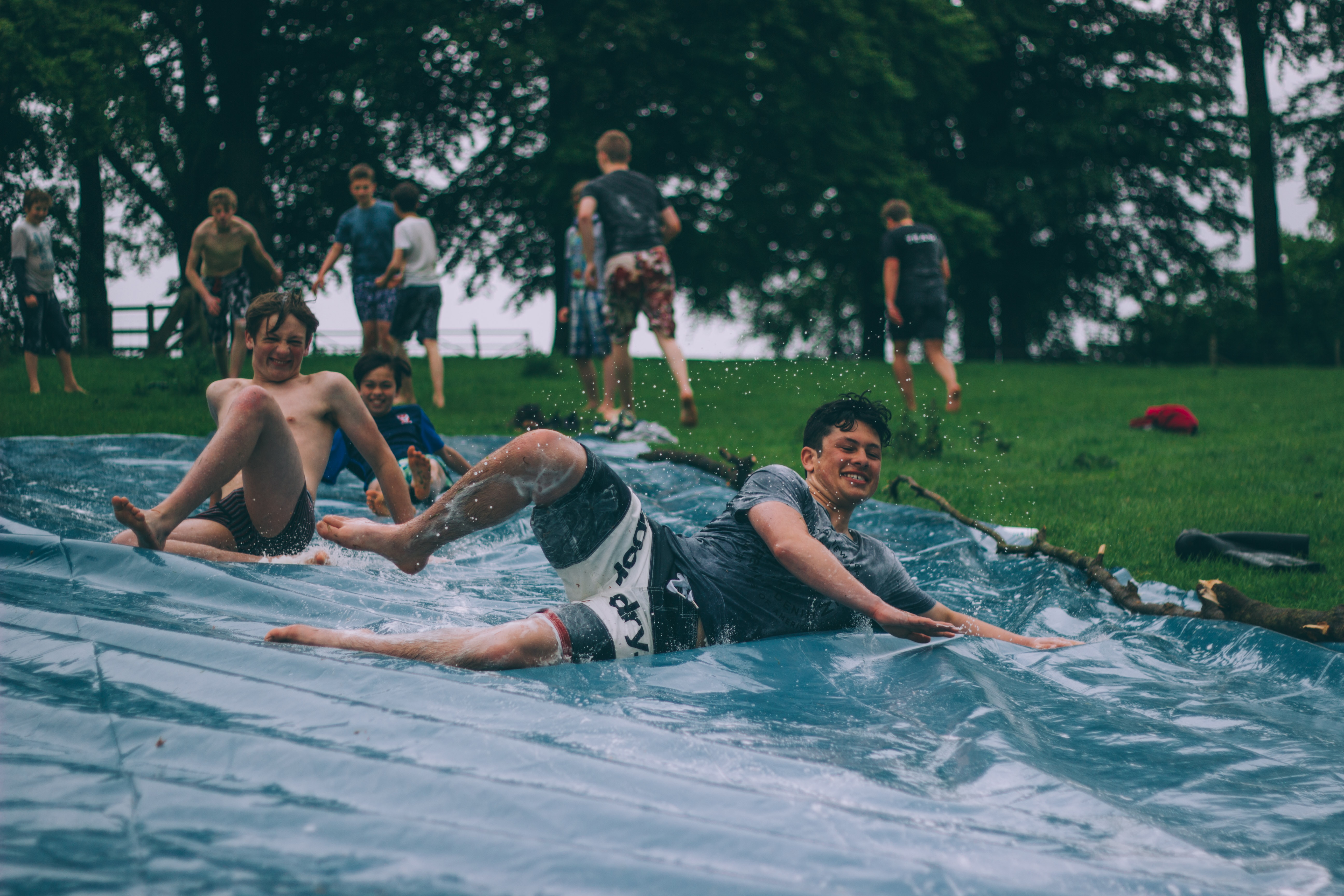 A backyard slide is an easy and fun DIY to beat the summer heat!