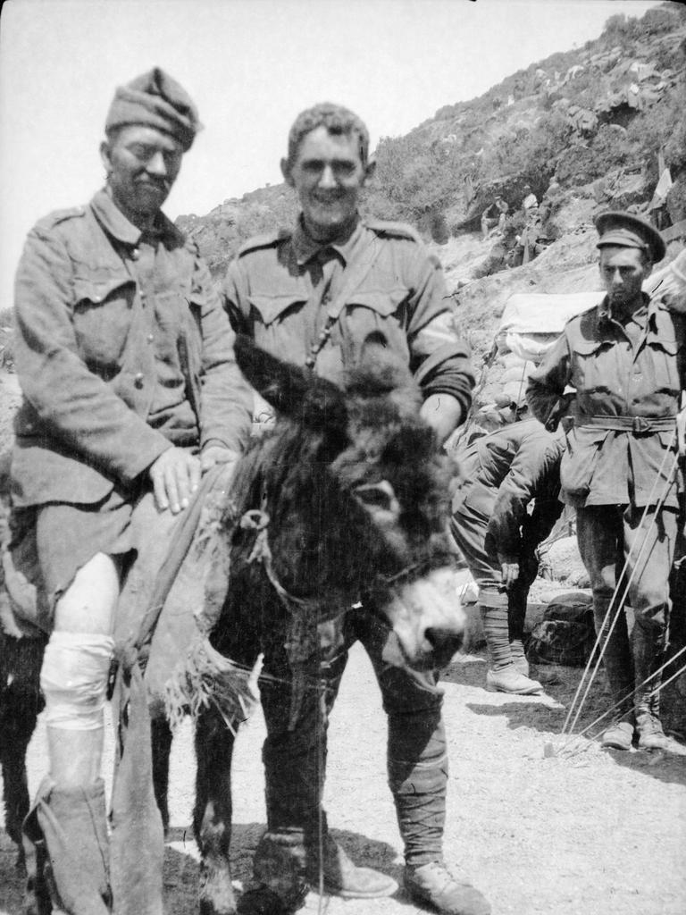 Simpson with a wounded soldier on his donkey. Australian War Memorial J06392