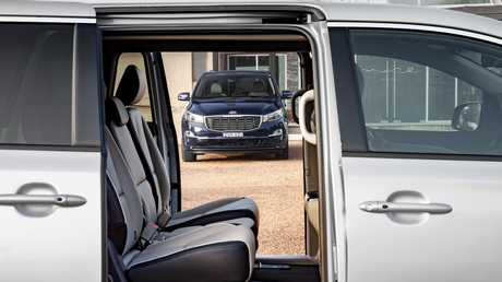 Powered sliding doors feature in the Kia Carnival Platinum Edition.