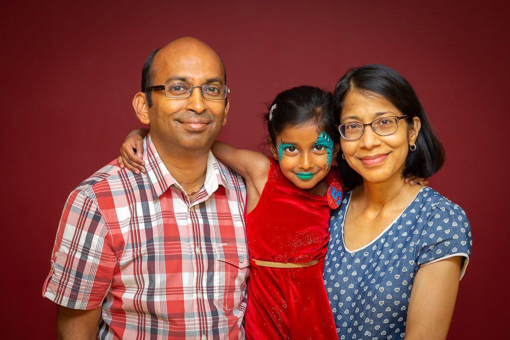 Vishna with his wife Liza and his daughter Katelyn.