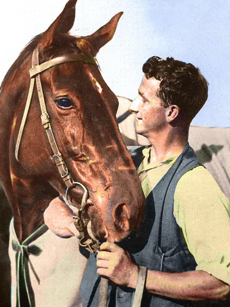 A colourised photo of strapper Tommy Woodcock with Phar Lap. Picture: Supplied