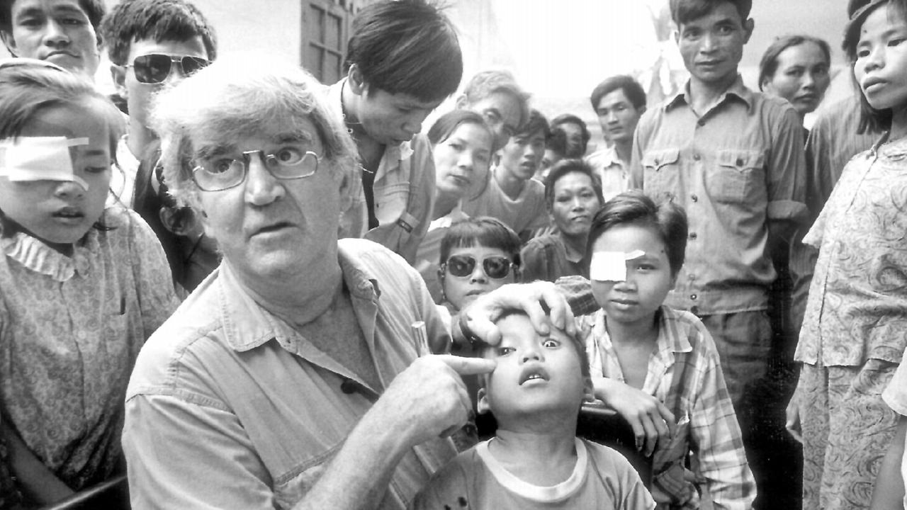Professor Hollows with patients in Hanoi in August, 1992. Picture: Michael Amendolia