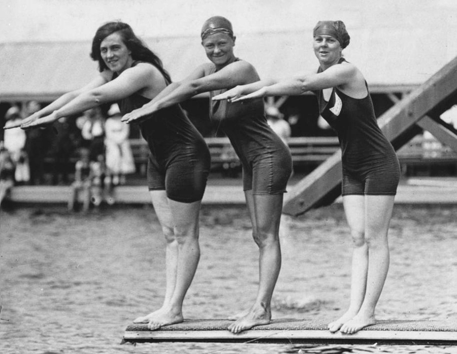 Fanny Durack (gold) Mina Wylie (silver) and British swimmer Jennie Fletcher (bronze) celebrate the 100m freestyle at 1912 Olympic Games in Stockholm.