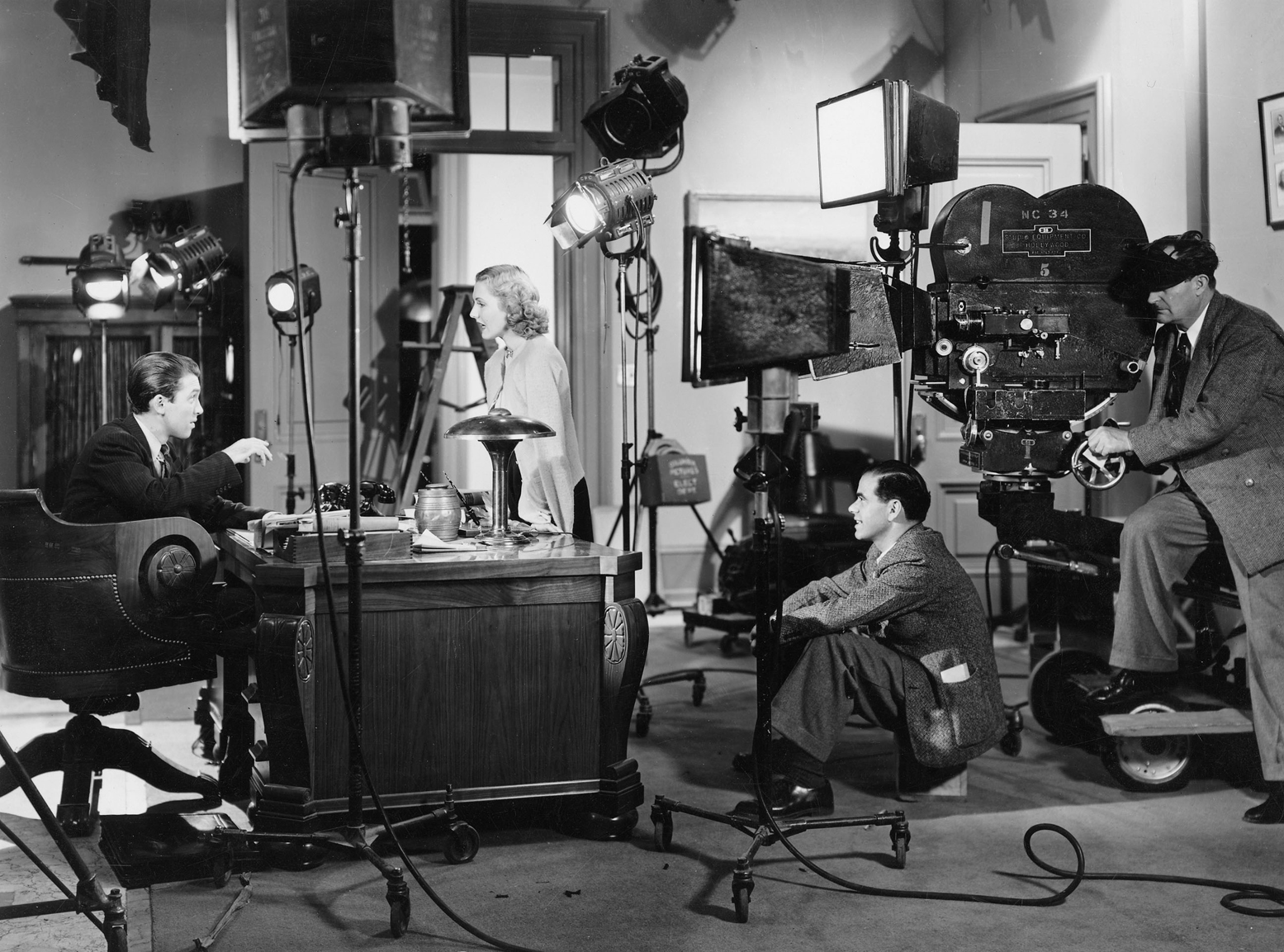 James Stewart, Jean Arthur and Frank Capra on set Mr. Smith Goes to Washington (1939). 
