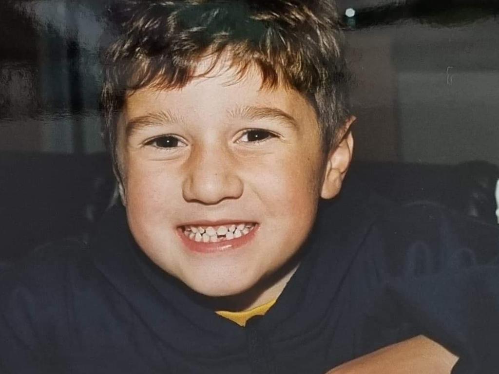 An infectious smile and bright heart … Adelaide real estate director Angelo Nickolas as a child.
