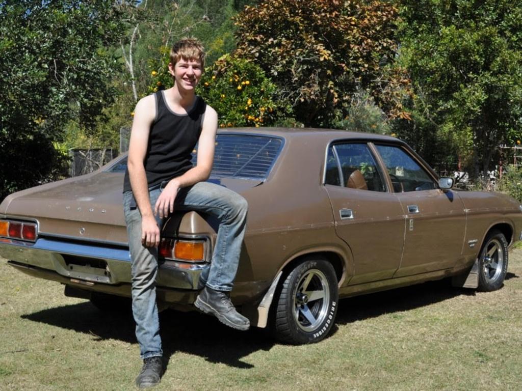 Always a Ford man — 15-year-old Jed Danahay with his first car, a 1976 XB Ford Falcon.
