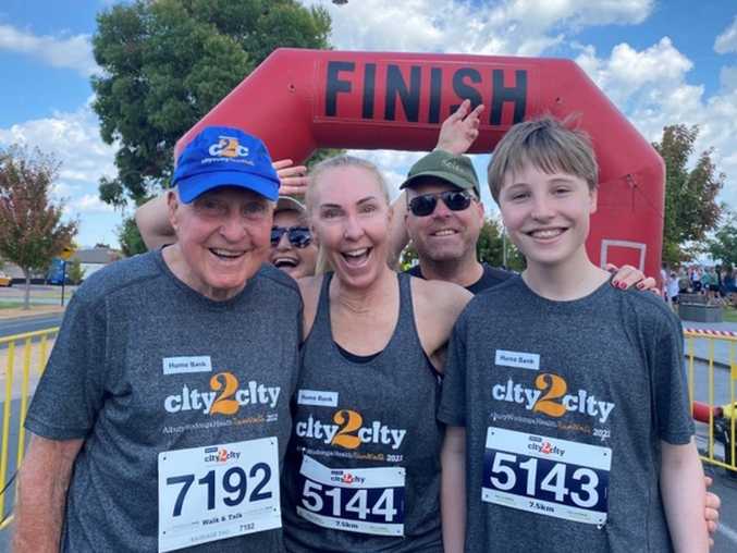 Rom Hayes, with daughter Jacquie and grandson Connor, and behind, son Paul and his wife Deeahn.