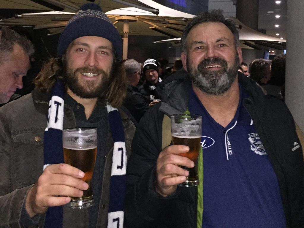 Mad Cats supporter Sam Flanders with his son Willis