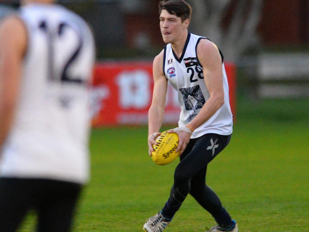 “Use your pace Will, grab it and run,” Sam Flanders would say to his son Willis Flanders at quarter-time. Willis is pictured training with the Geelong Falcons in 2013.