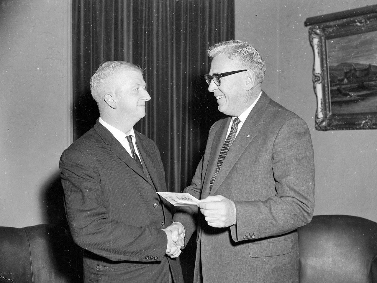 Keith was well known at Hobart's Avalon cinema as a singularly regular film-goer. Here he's receiving his weekly ticket from Mr D.G. Henderson in 1966.