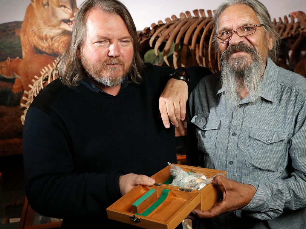 South Australian archaeologist Giles Hamm and Cliff Coulthard in 2016 after the dig that unearthed 49,000 year-old artefacts, including the world’s oldest bone tool, at the Warratyi Rock Shelter in the Flinders Ranges. Picture: Calum Robertson