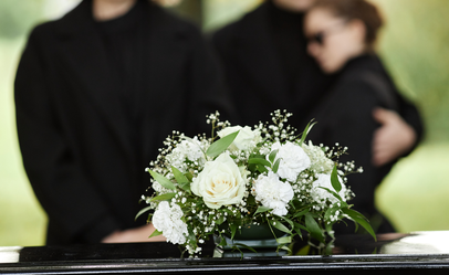 What is the funeral attire for women and men to pay respects