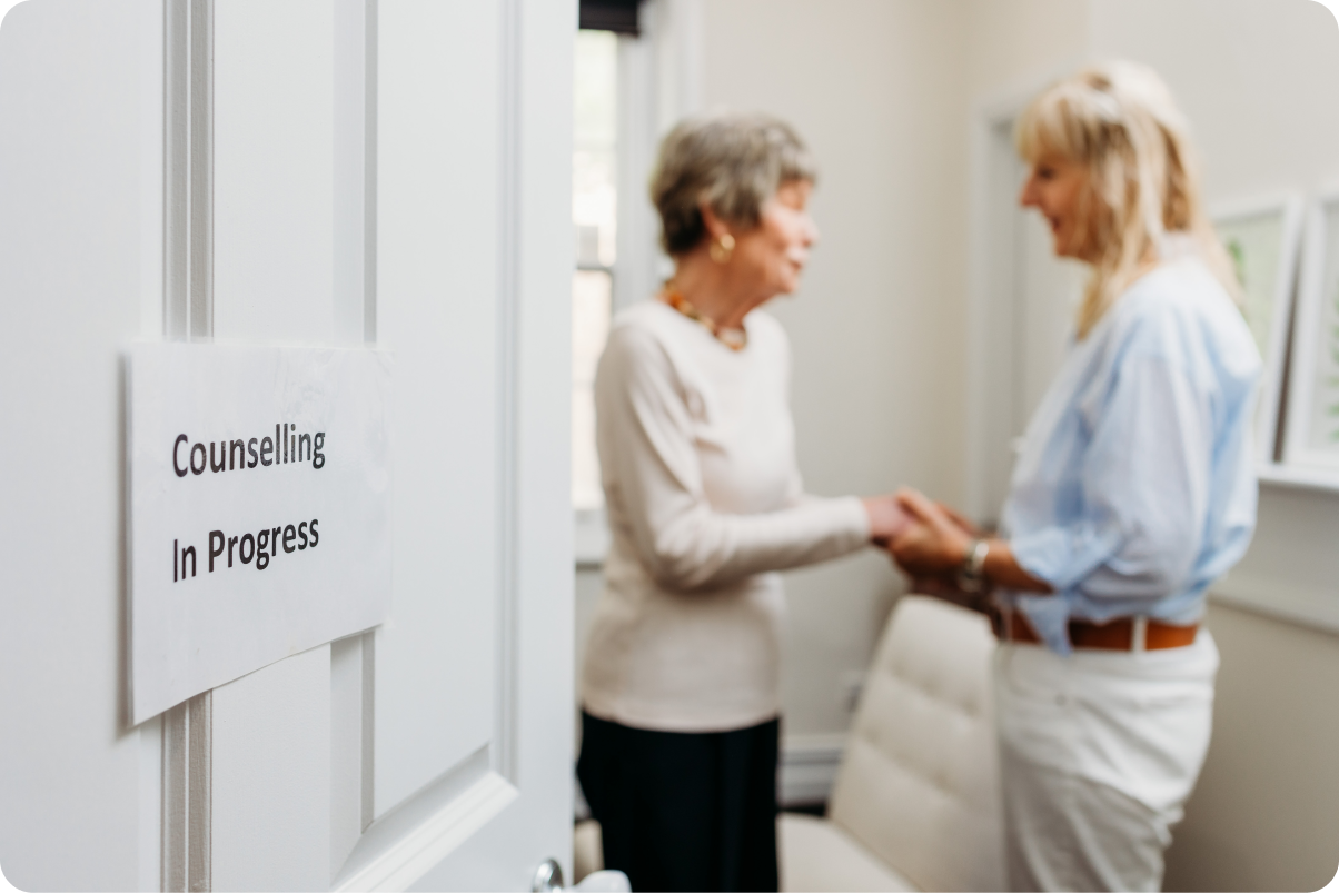 Support Counselor hugging client