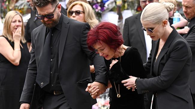 Jack Osbourne, Sharon Osbourne and Kelly Osbourne arrive to view tributes to the late Ozzy Osbourne - July 30, 2025 in Birmingham, England. (Photo by Leon Neal/Getty Images)
